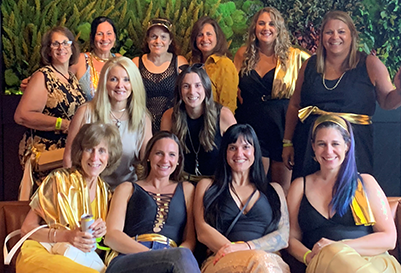 A group of Envoyage advisors at a company celebration